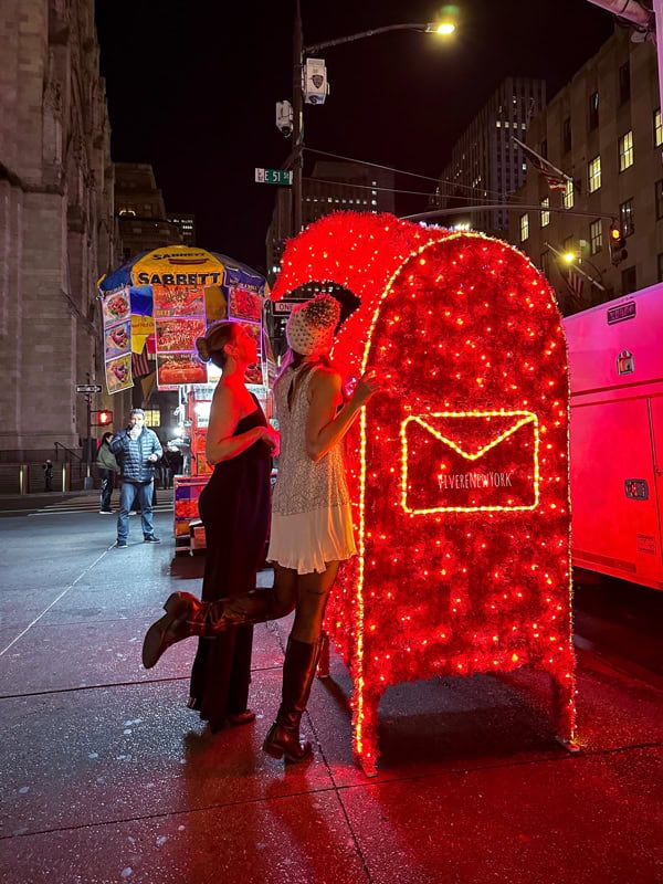 Fifth Avenue holiday decorations NYC Christmas storefronts Saks light show Midtown