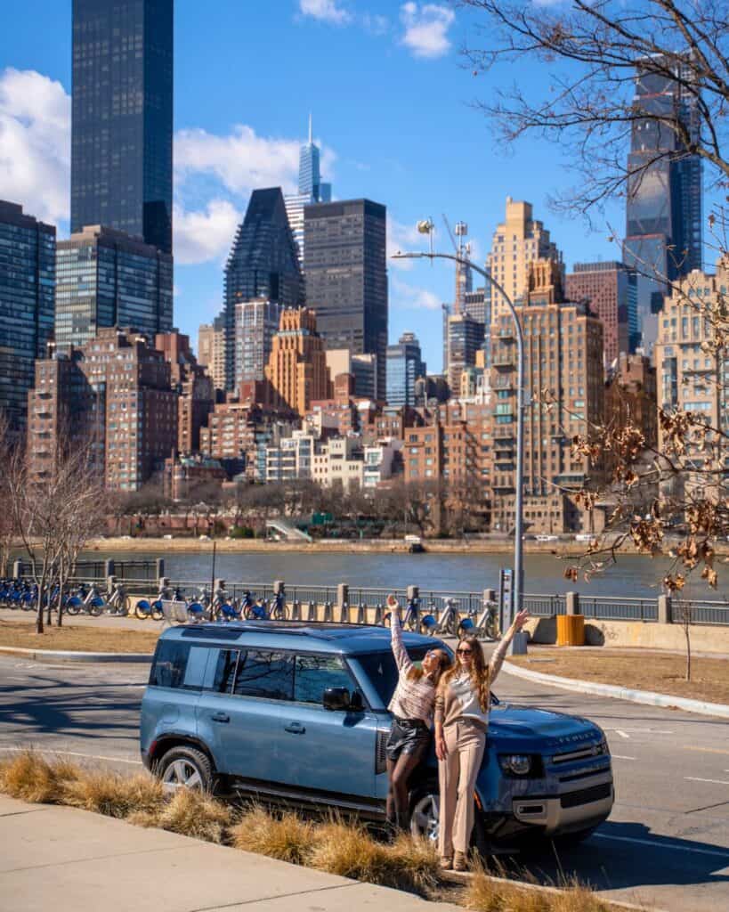 Land Rover Defender parked along the East River in NYC before a road trip to Manchester Vermont