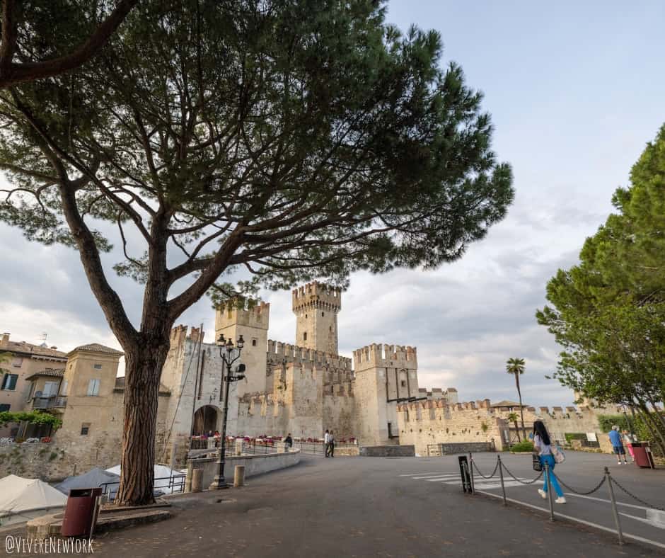 Sirmione Castle at sunset reflecting on Lake Garda Italy - Brescia itinerary day 1