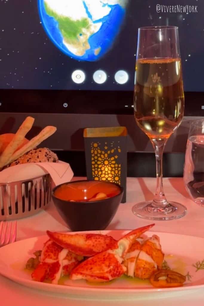 Qatar Airways Qsuite private suite sliding doors luxury business class Milan to Doha