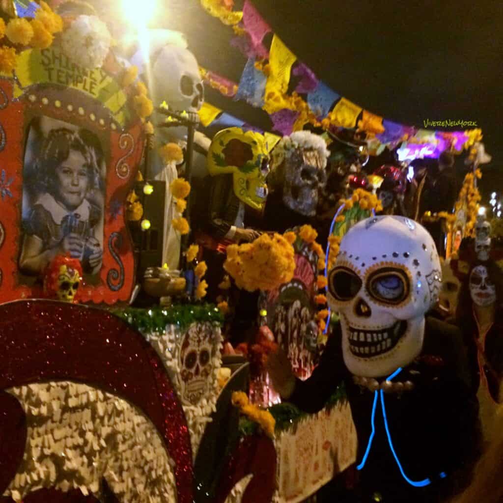 Village Halloween Parade float skull Day of Dead decorations 6th Avenue NYC October 31