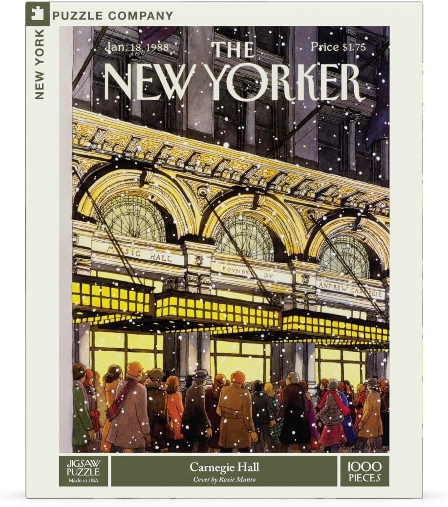 1000-piece New Yorker puzzle featuring a snowy Carnegie Hall illustration on the box, warm lights and winter crowd.