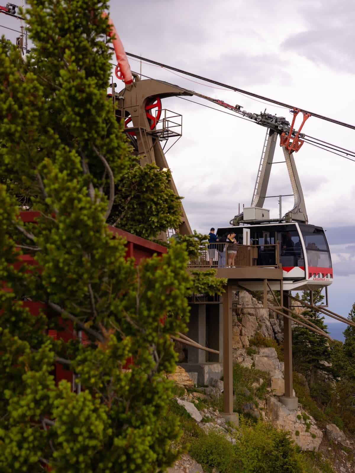 The Sandia Peak Tramway car arriving at the mountaintop terminal in Albuquerque, a highlight of any New Mexico itinerary