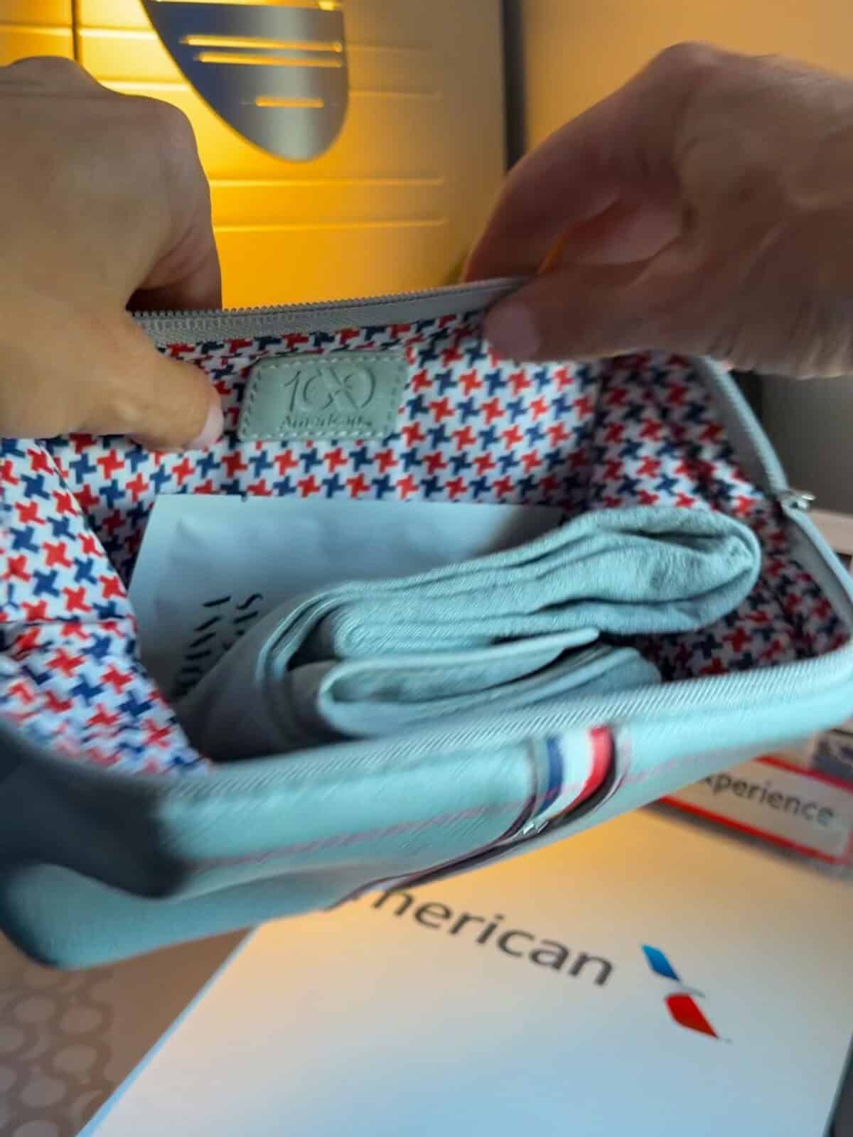 Inside the American Airlines Silverbird centennial amenity kit provided in the Flagship Suite